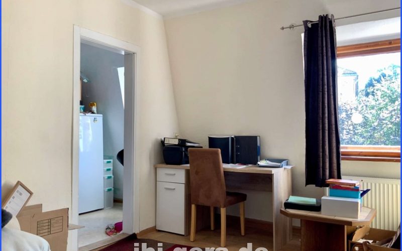 WE 3 Wohnzimmer mit Blick in Küche